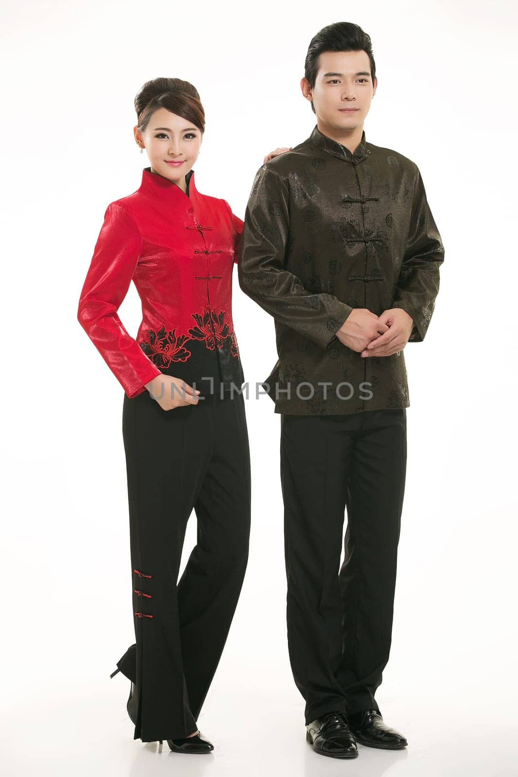 Wearing Chinese clothing waiter in front of a white background