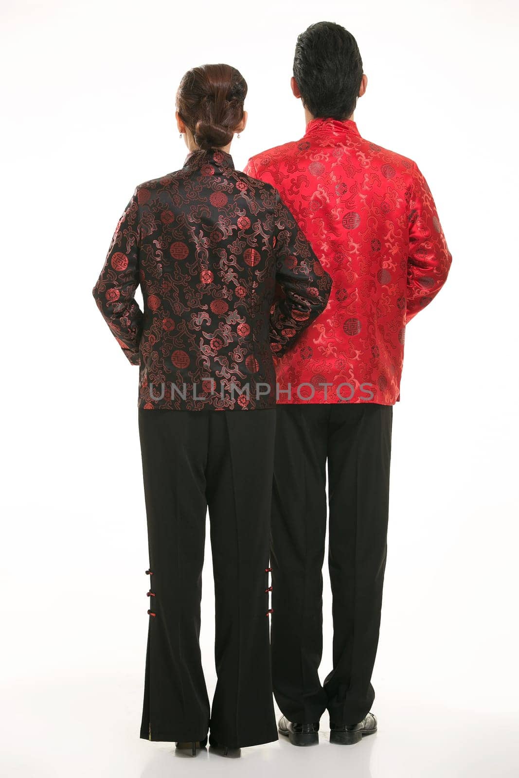 Wearing Chinese clothing waiter in front of a white background