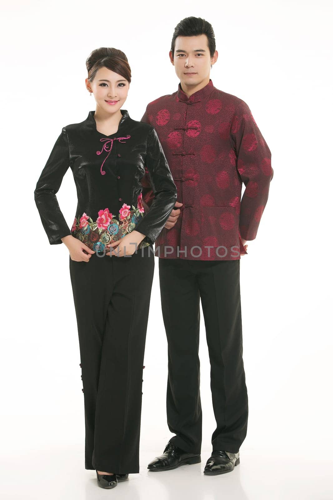 Wearing Chinese clothing waiter in front of a white background