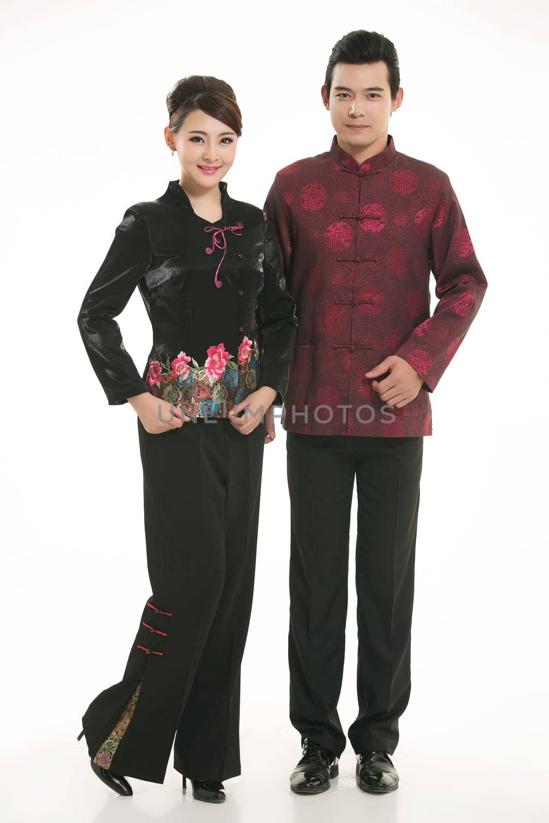 Wearing Chinese clothing waiter in front of a white background