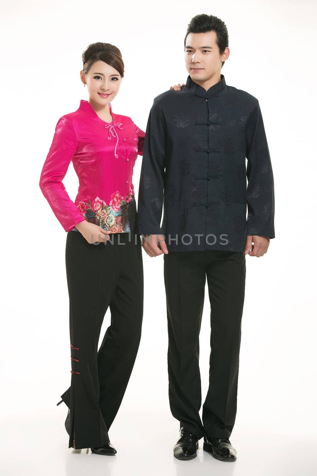 Wearing Chinese clothing waiter in front of a white background