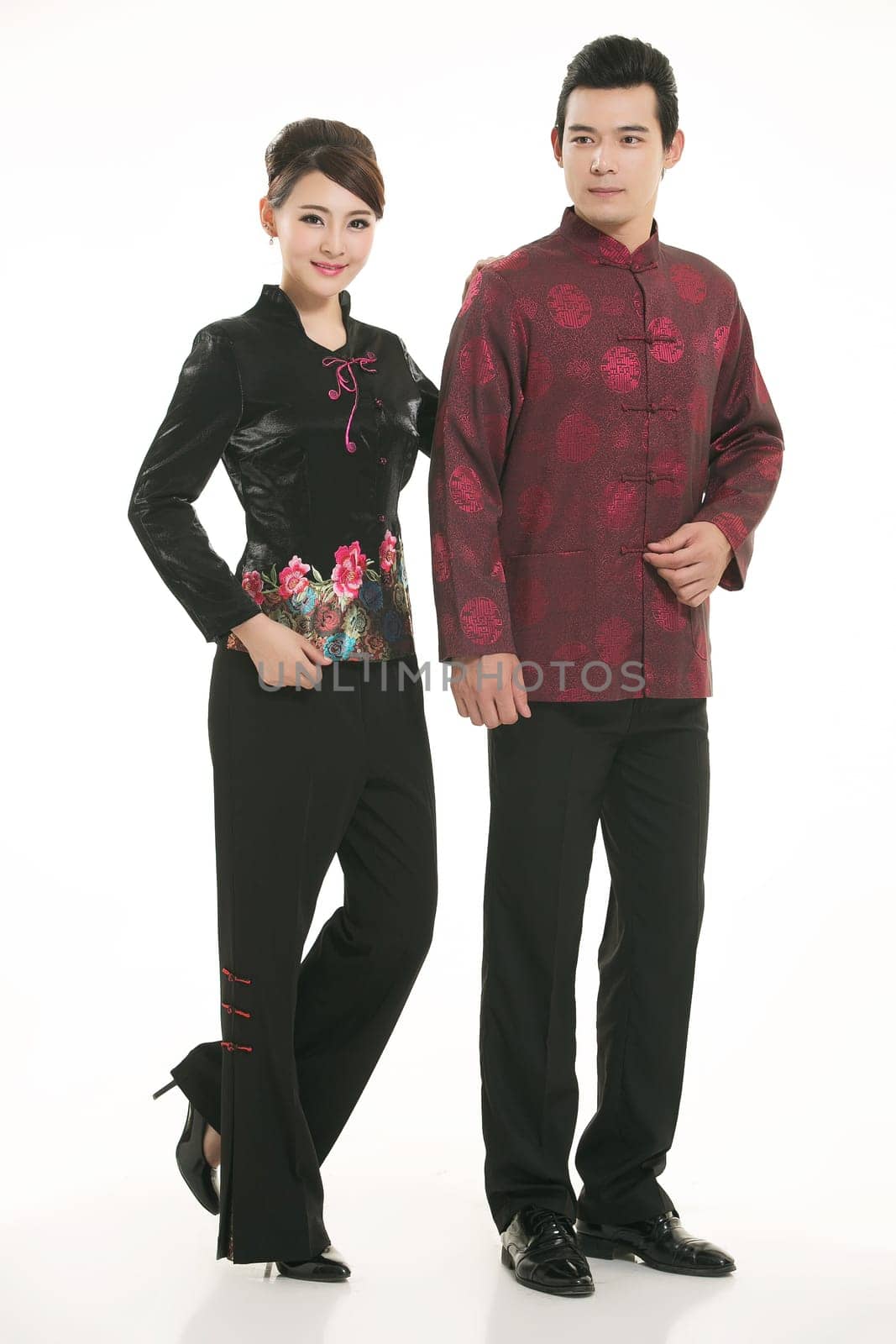 Wearing Chinese clothing waiter in front of a white background