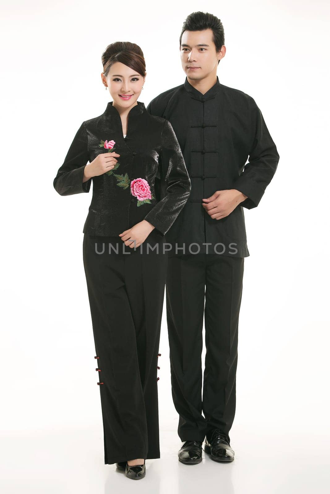 Wearing Chinese clothing waiter in front of a white background