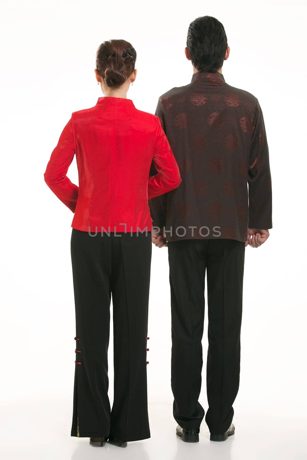 Wearing Chinese clothing waiter in front of a white background
