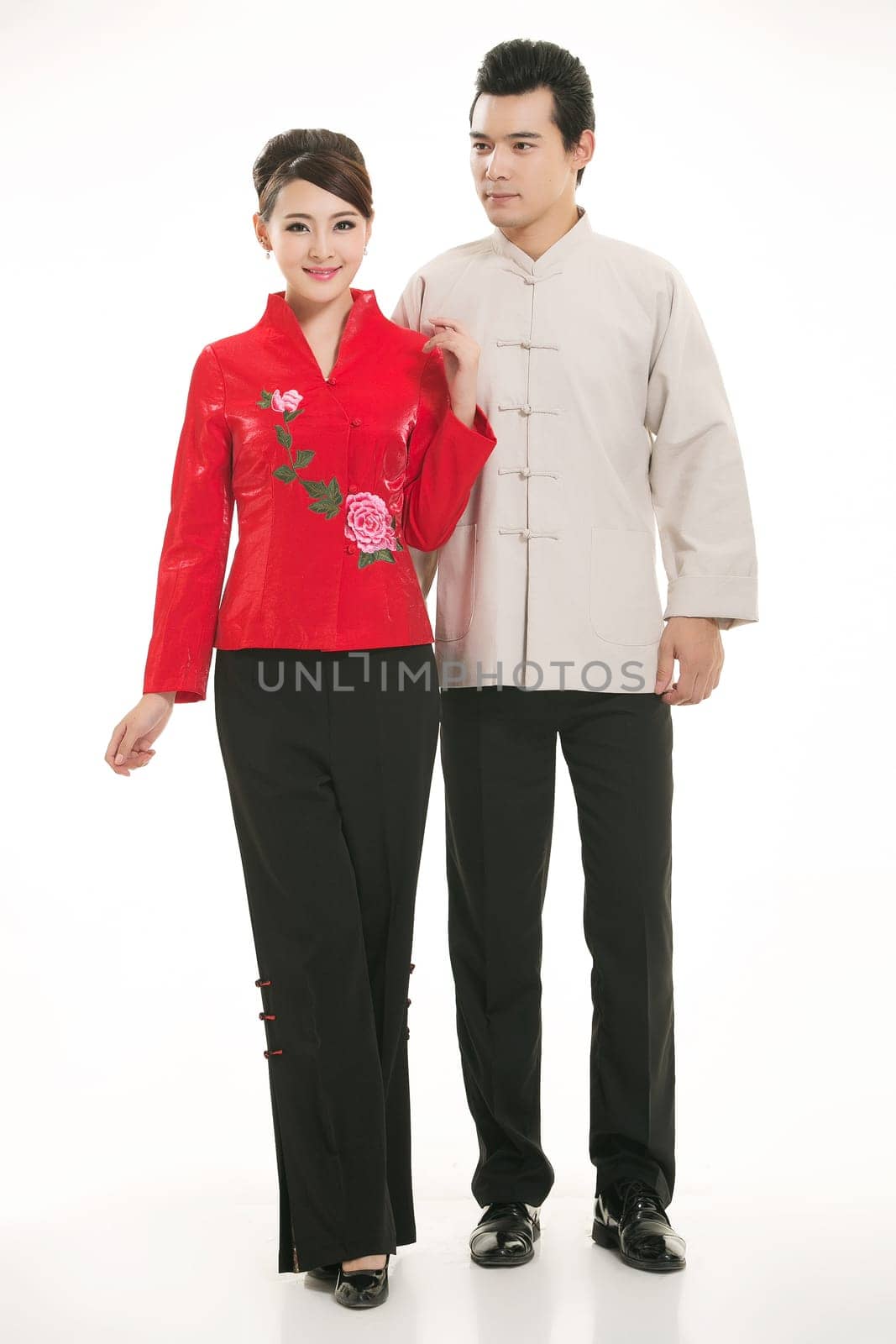 Wearing Chinese clothing waiter in front of a white background