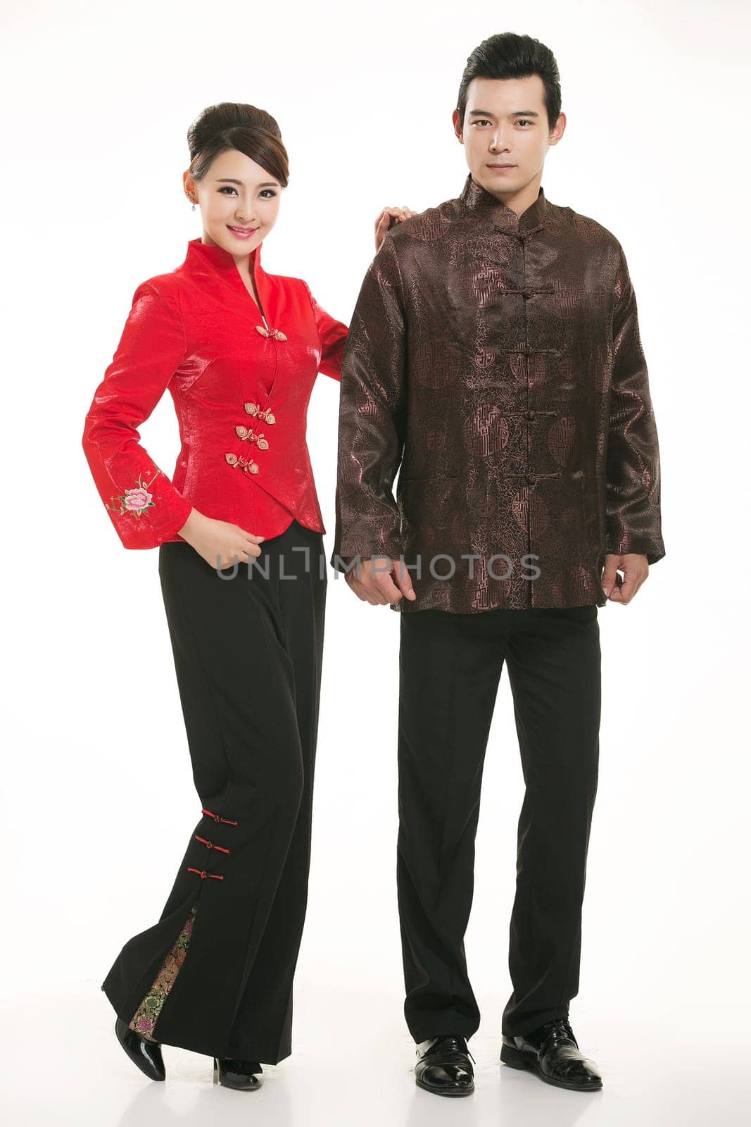 Wearing Chinese clothing waiter in front of a white background