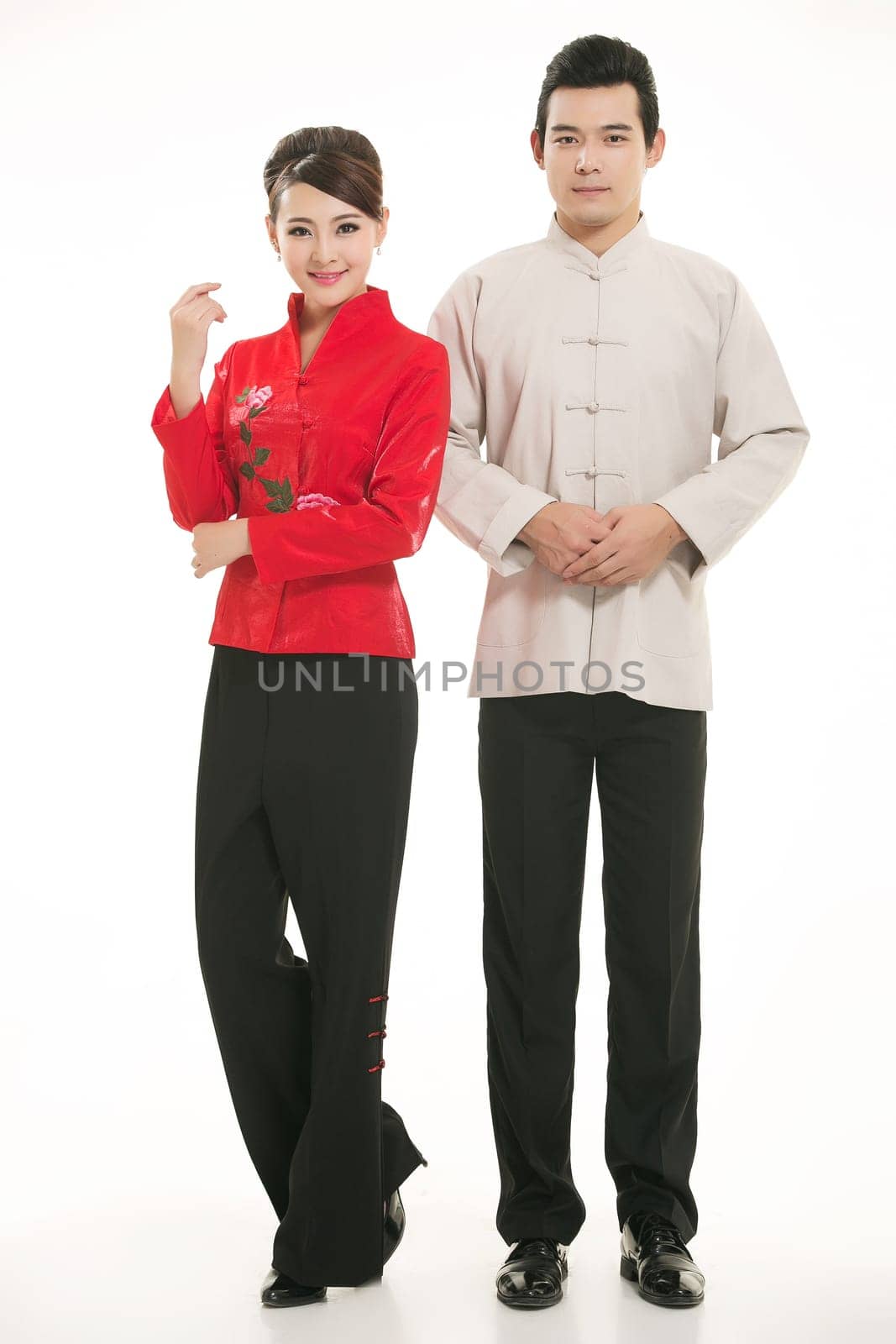 Wearing Chinese clothing waiter in front of a white background