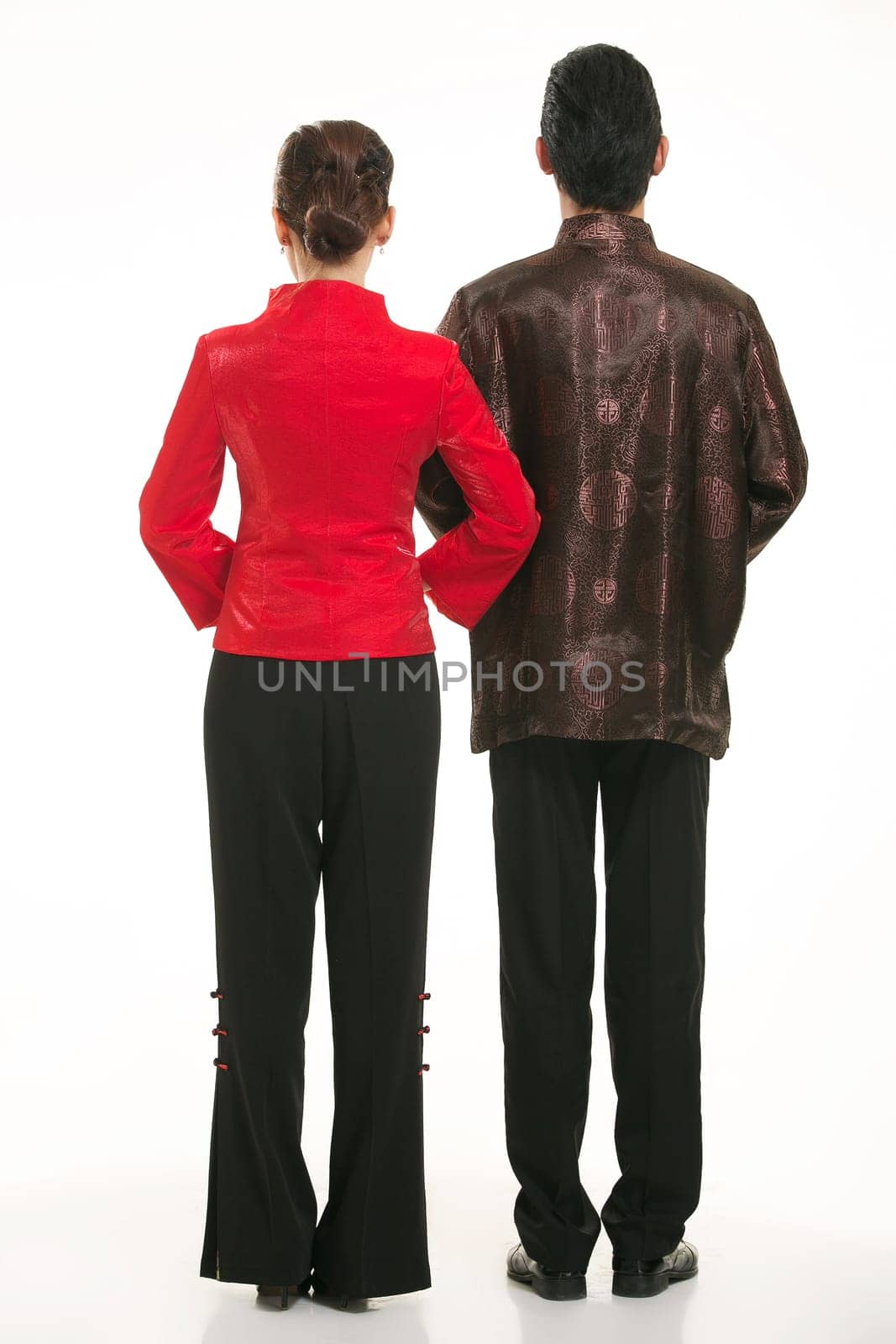 Wearing Chinese clothing waiter in front of a white background