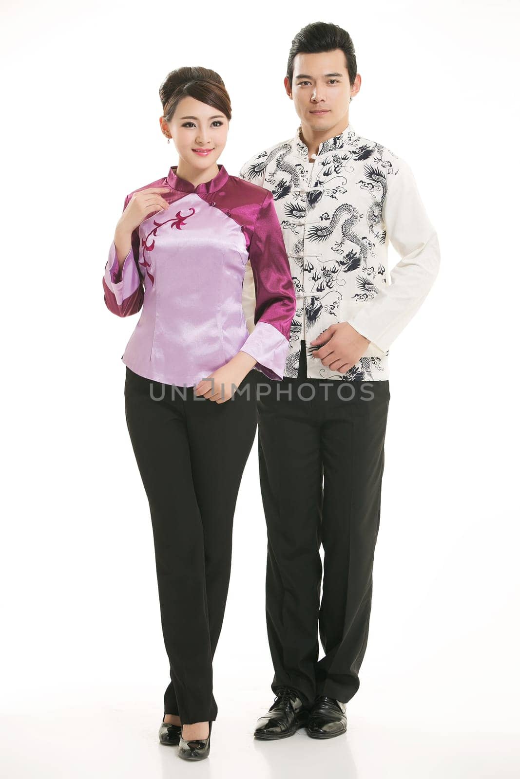 Wearing Chinese clothing waiter in front of a white background