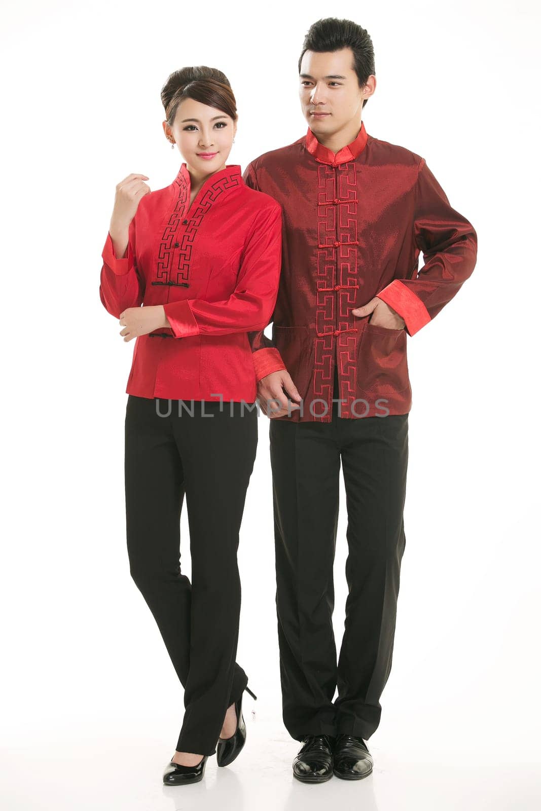 Wearing Chinese clothing waiter in front of a white background