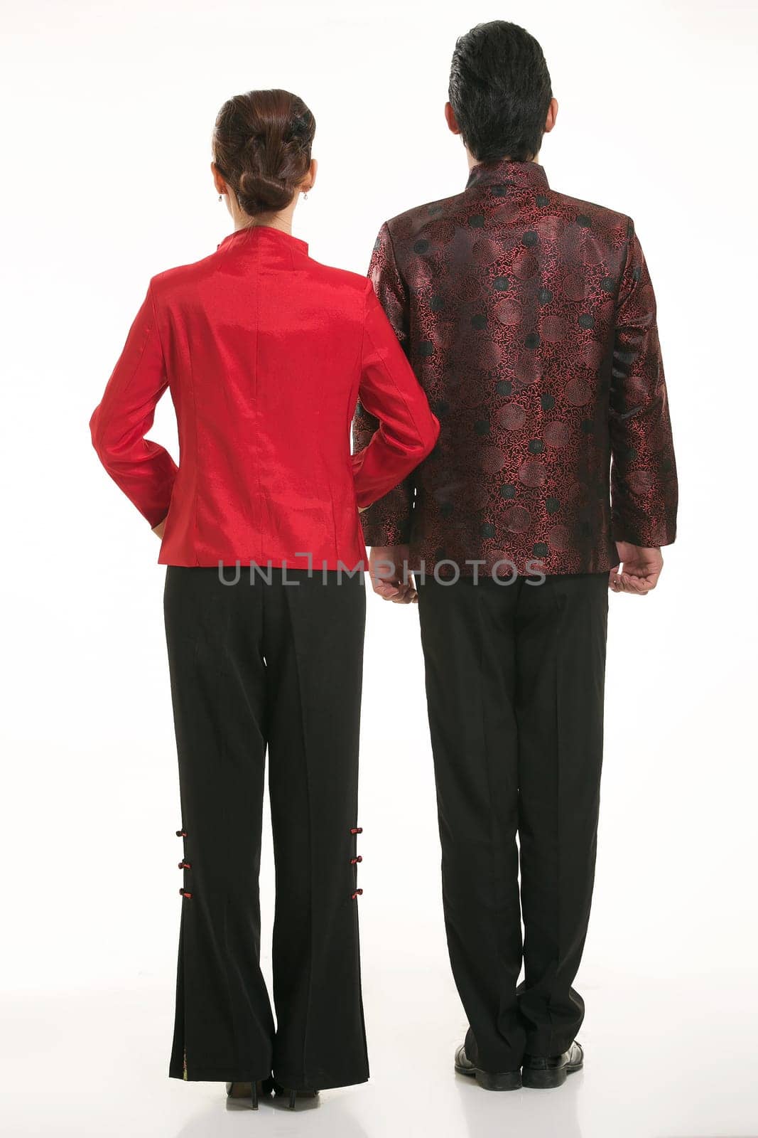 Wearing Chinese clothing waiter in front of a white background