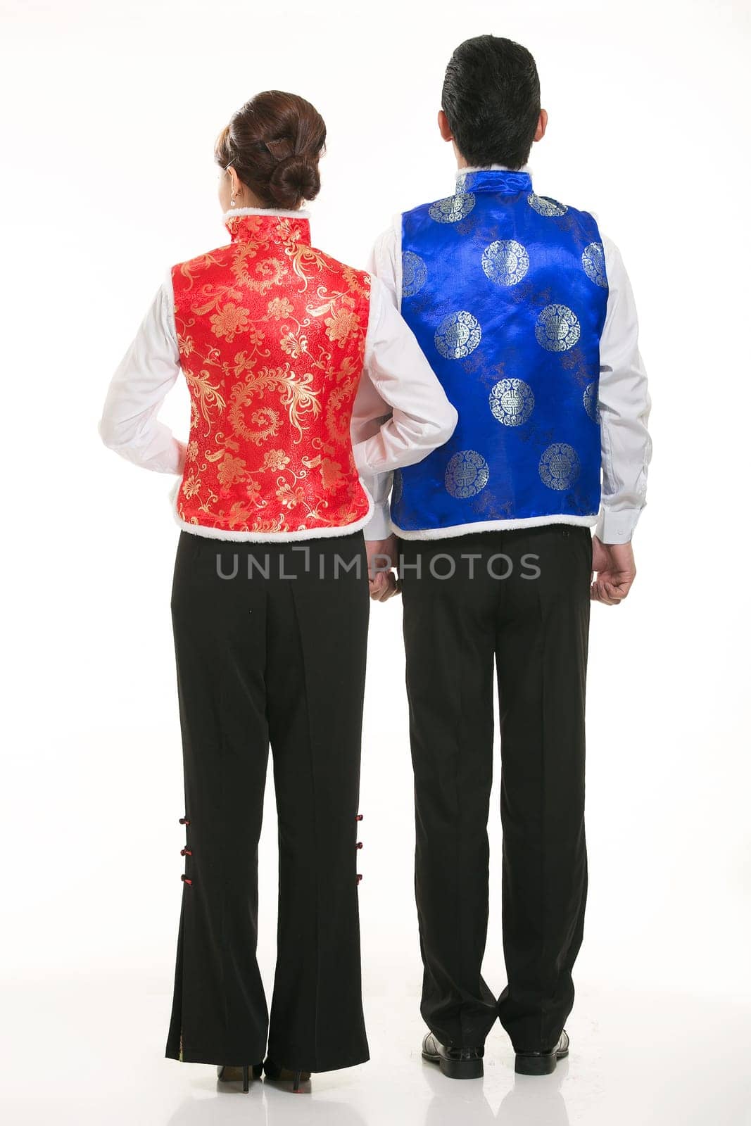 Wearing Chinese clothing waiter in front of a white background