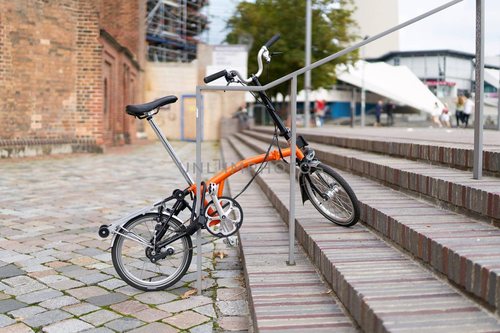Bicycle on a stair railing in the center of Berlin