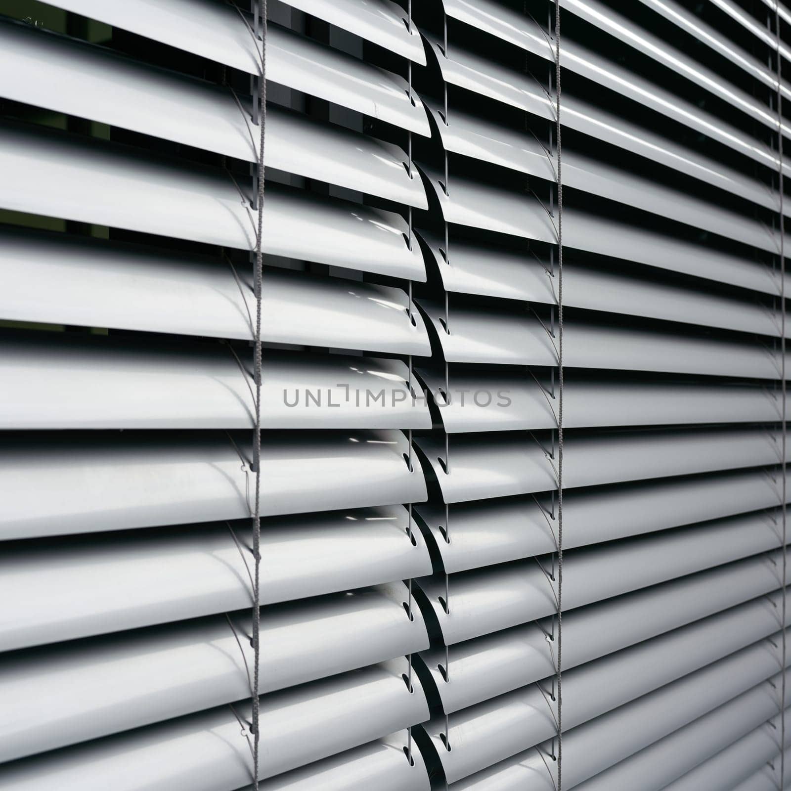 Blinds as sun protection on the window of an office building in Berlin in Germany