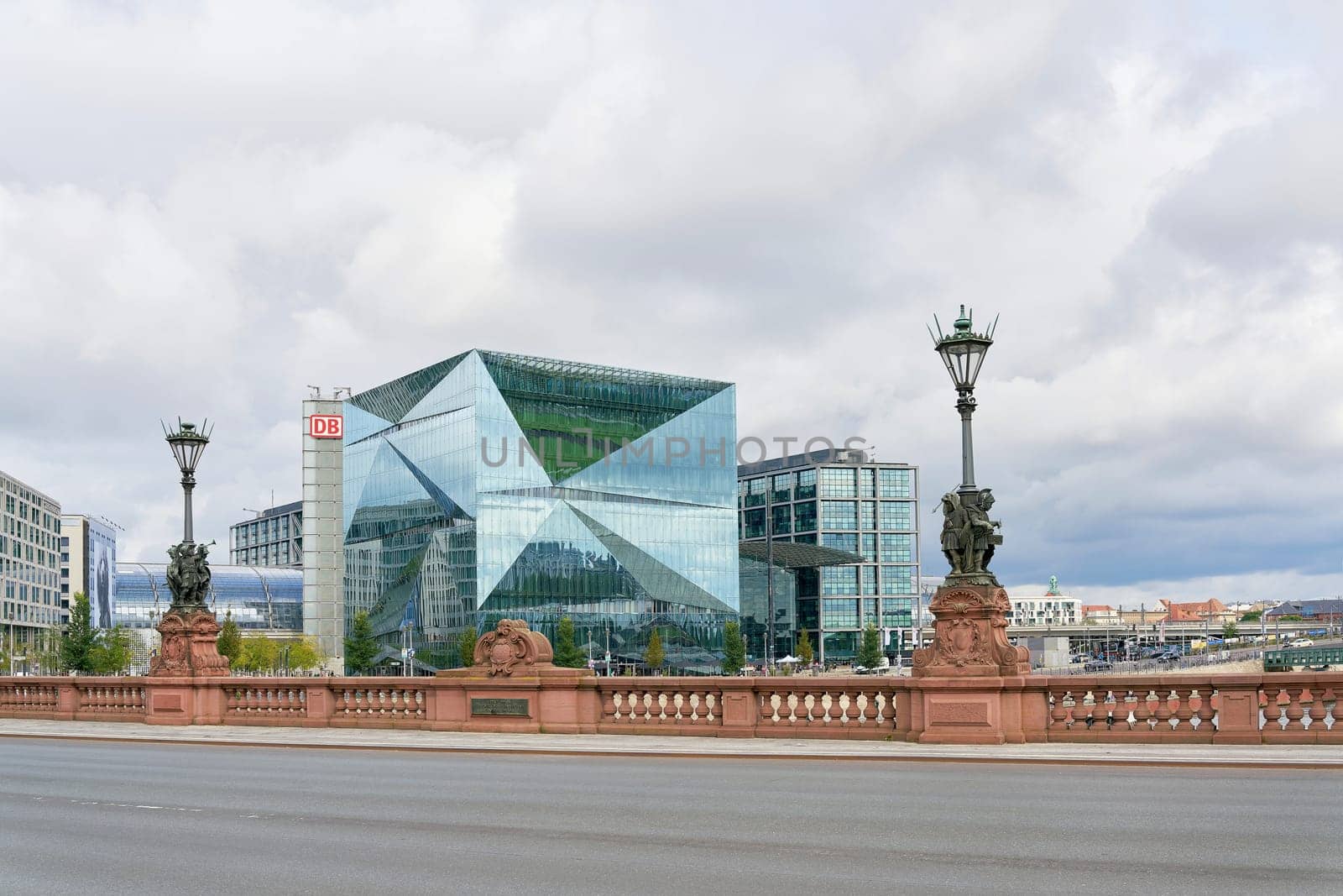 The Cube Berlin office building on Washingtonplatz, with the main train station in Berlin behind it
