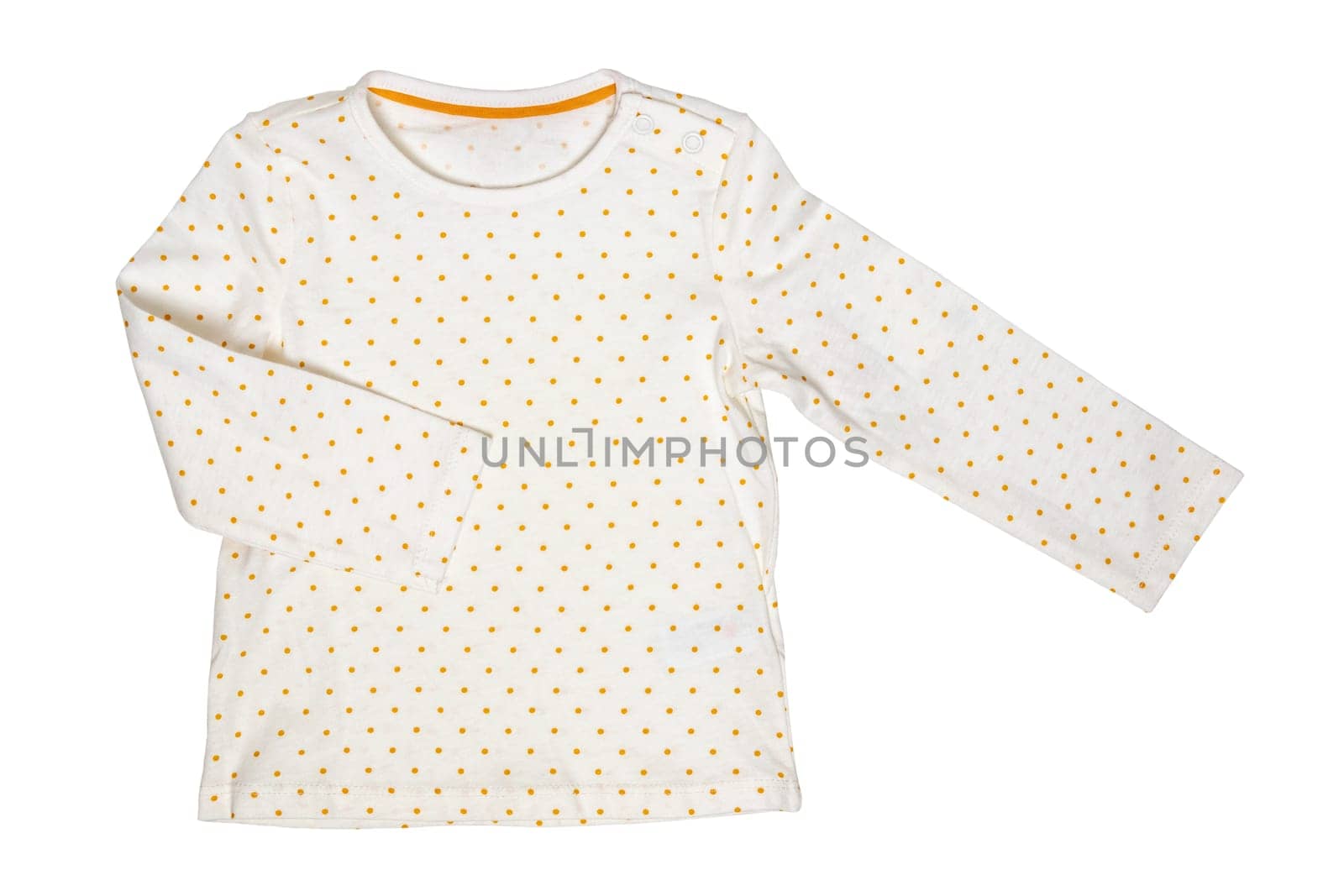 Summer shirt isolated. Closeup of a white baby girl shirt or t-shirt with yellow polka dots isolated on a white background. Children spring fashion.