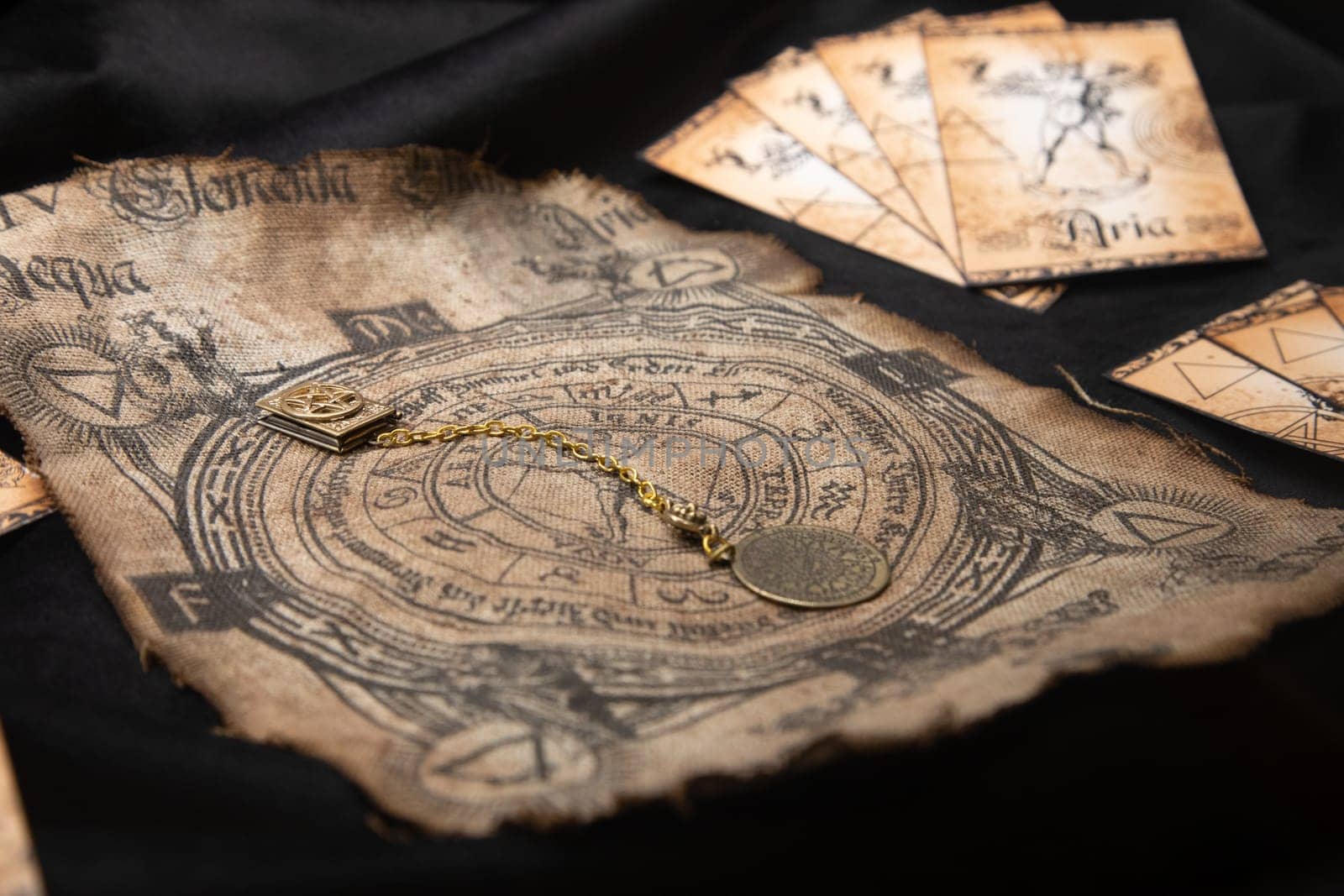 Ancient esoteric witchcraft background. Occultims and paganism old symbol, with mysterious runes and alphabet.