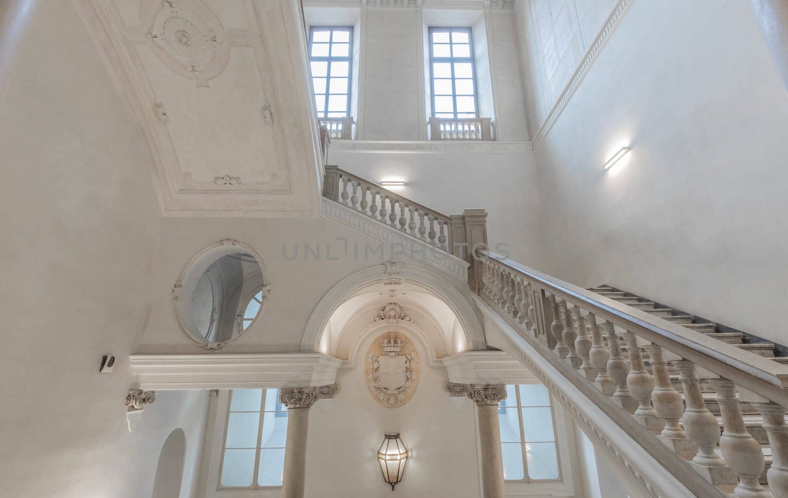 TURIN, ITALY - CIRCA MAY 2021: luxury staircase made of marble in an antique Italian palace