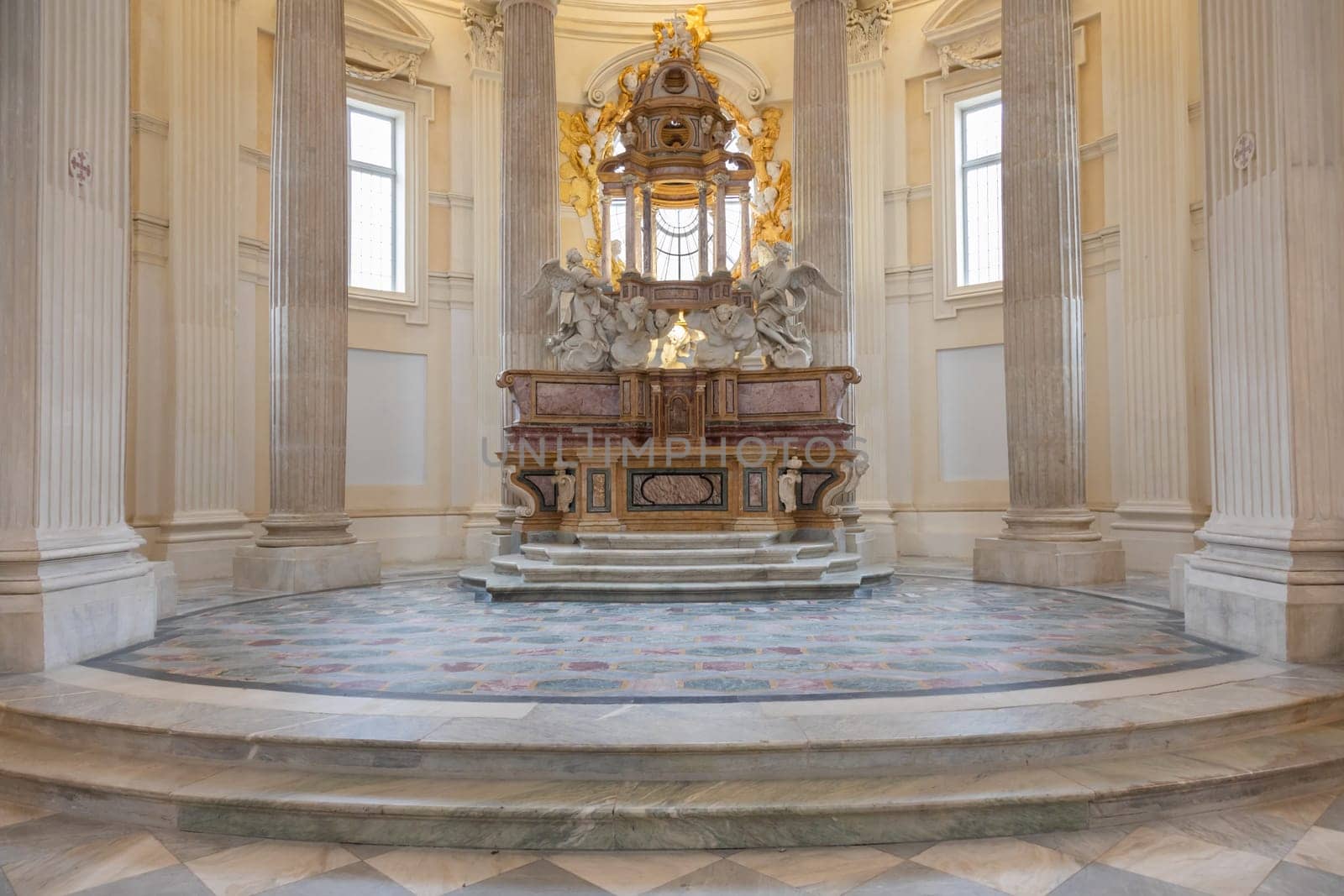 VENARIA REALE, ITALY - Circa January 2022: Baroque catholic church altar. Old interior religious building.