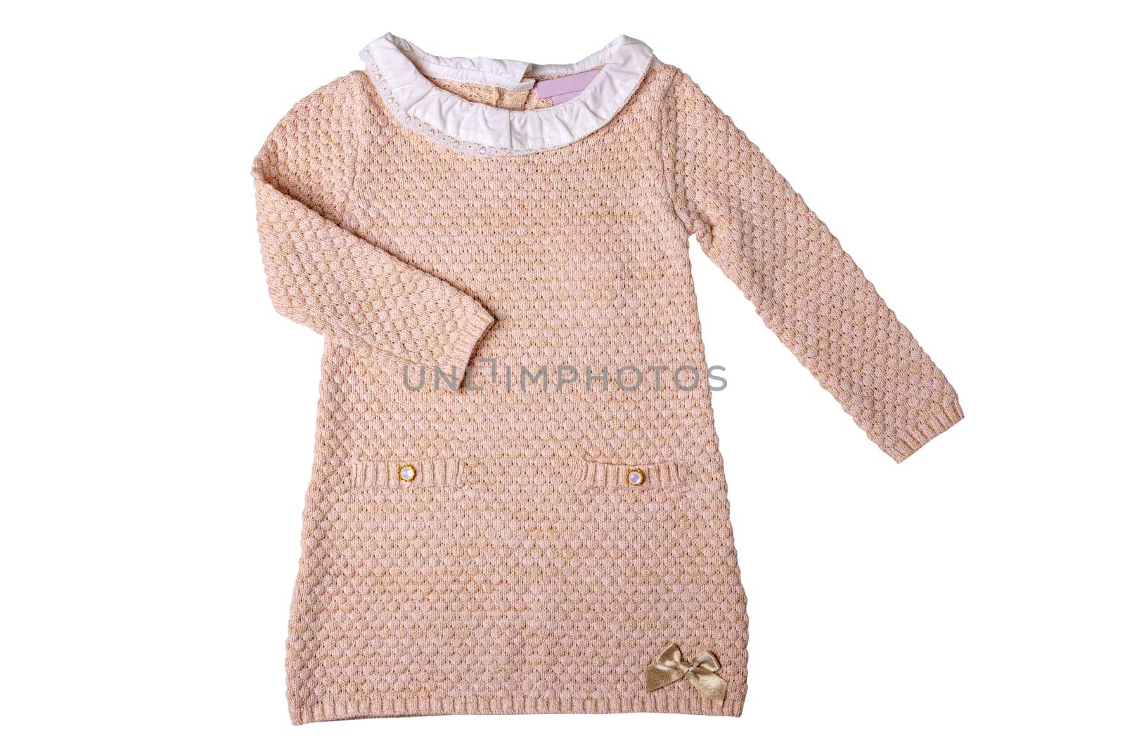 Clothes for children. A beautiful pink baby girl dress with white lace collar and long sleeves isolated on a white background. Clipping path. Kids autumn and spring fashion.