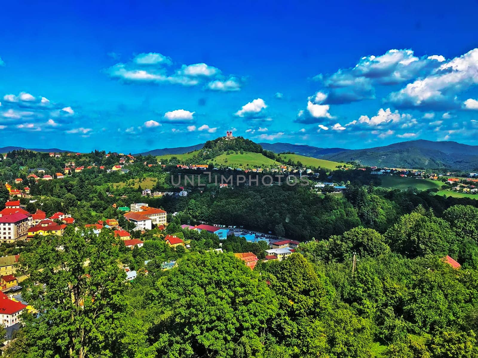 View of Banska Stiavnica with church on the Hill in Slovakia