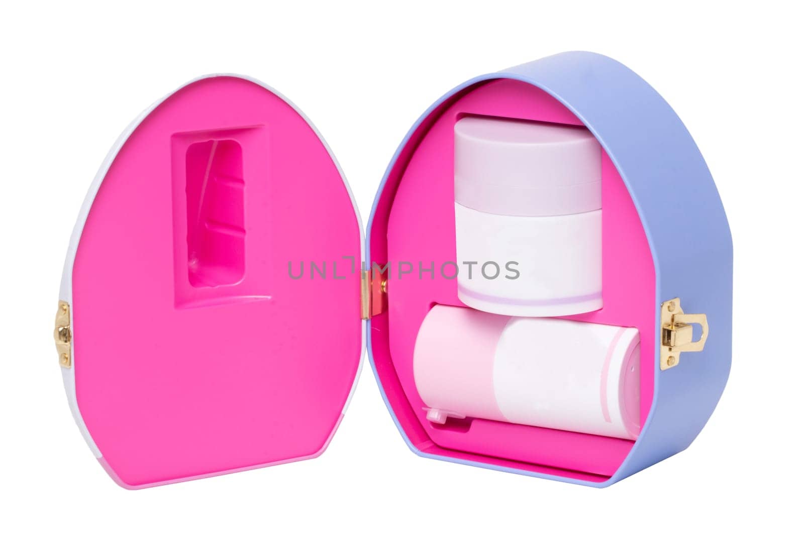Closeup of an opened decorative cosmetic box or gift box with label-free pink white containers isolated on a white background. Macro.