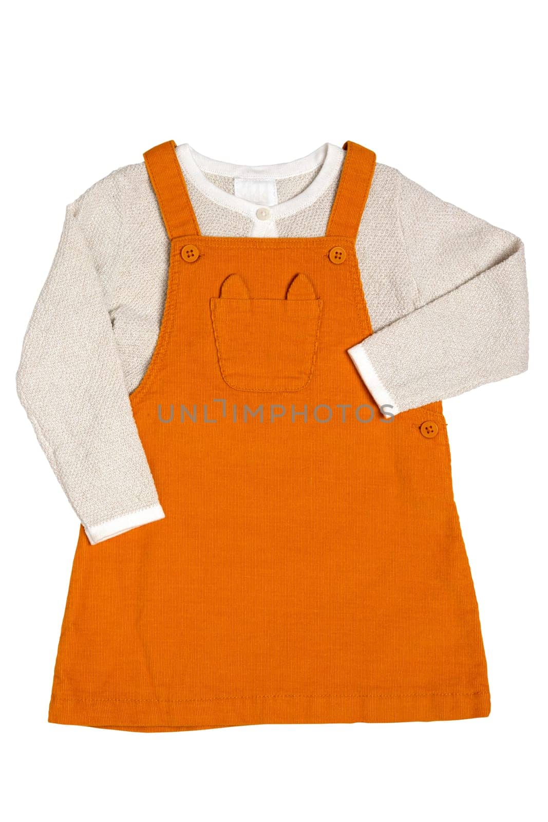 Summer dress isolated. Closeup of a beautiful orange baby girl dress and a beige shirt with isolated on a white background. Clipping path. Children spring fashion.