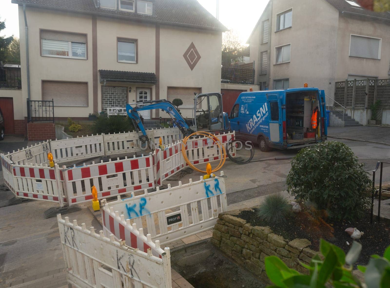 Heiligenhaus, Nrw, Germany - October 29, 2019:.Civil engineering works for the installation of gas, water and power lines for a new environmentally friendly fuel cell heating