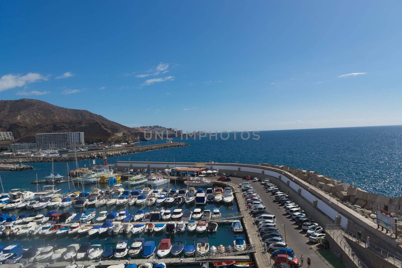 Cran Canaria, Puerto Rico, Spain - November 16, 2019:.Marina in Puerto Rico de Gran Canaria. Postcard, spain.