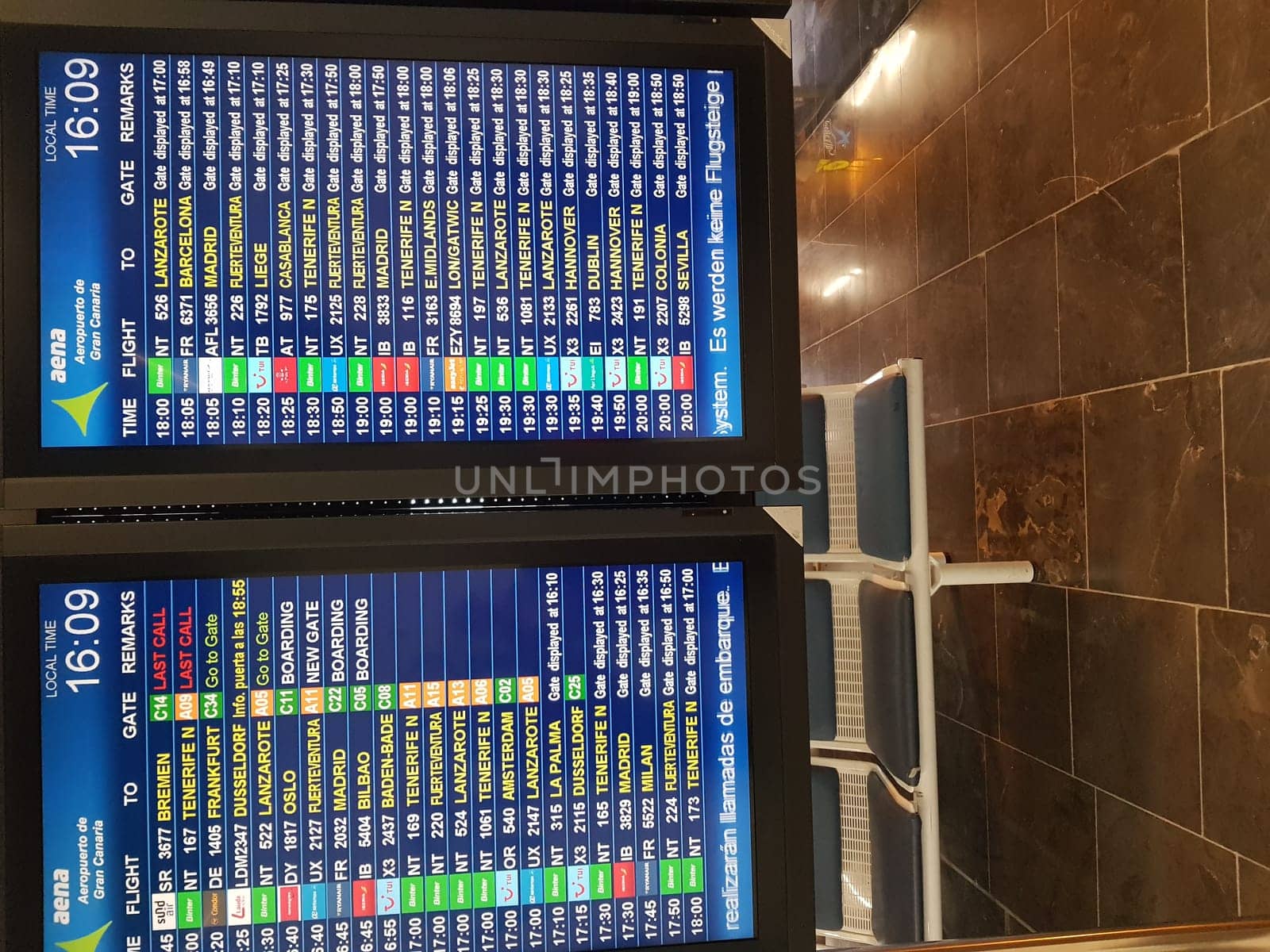 Cran Canaria, Meloneras, Spain- 17. November 2019:.Airport board at Gran Canaria airport. Realistic flip scoreboard airport template. Airport black board with alphabet and numbers. Digital airport board font on blue background. Target screen board eps