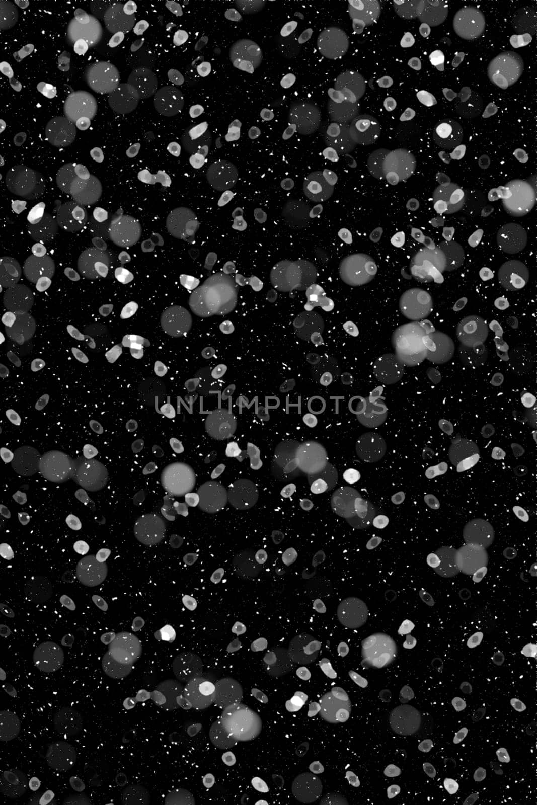 Real falling snow on a black background