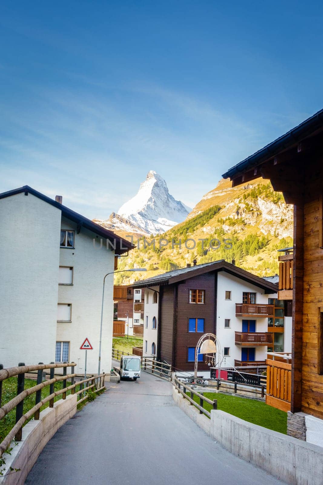 A street in the Swiss resort town of Zermat with a view of Matterhorn