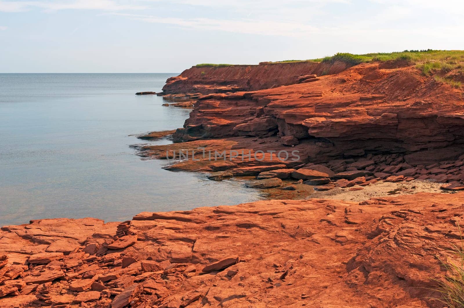 Red Sandstone Cliffs at Low Tide on Cavendish Beach at Prince Edward Island National Park in Canada