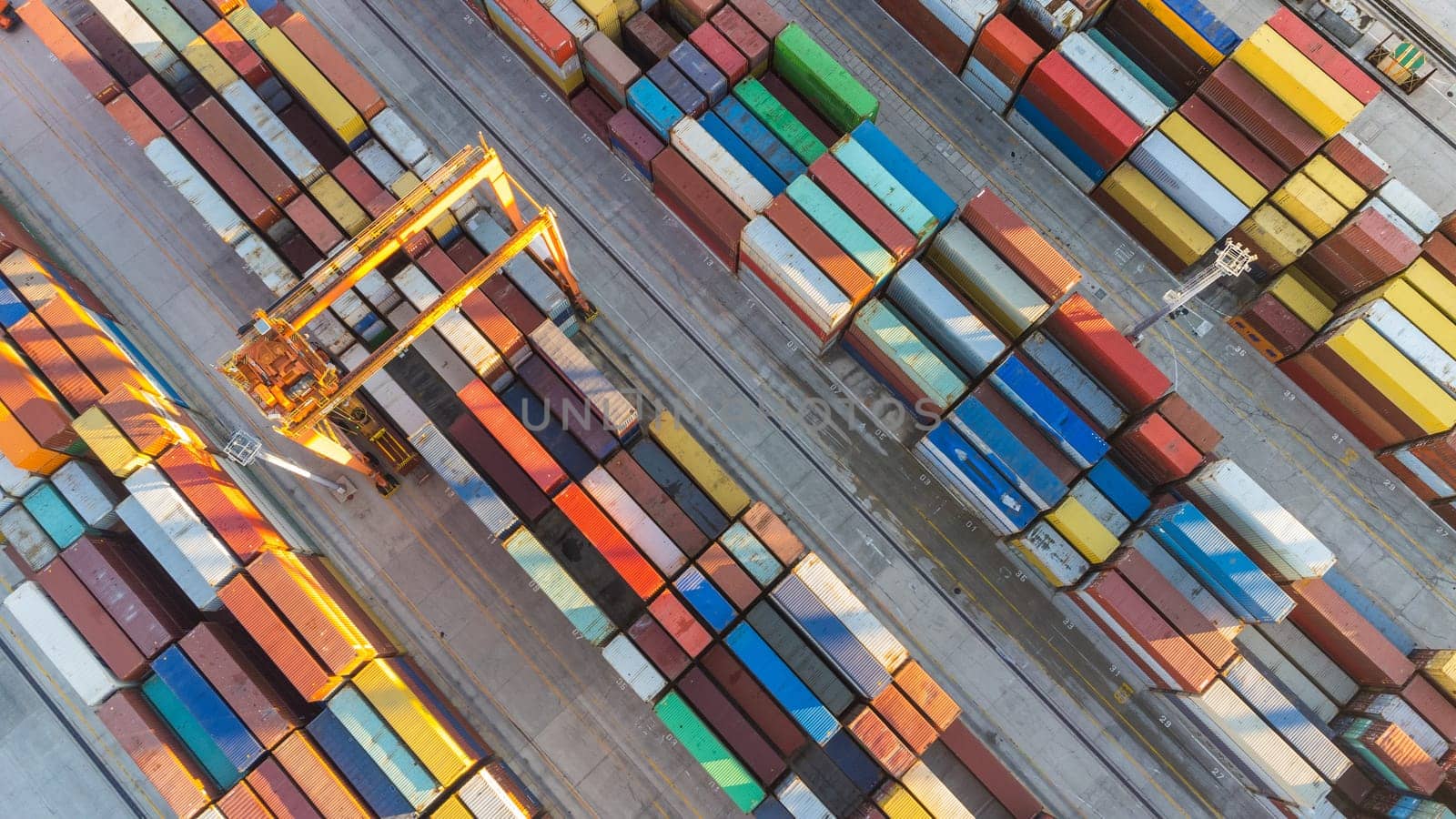 Aerial view of shipping container port terminal. Colourful pattern of containers in harbor. Maritime logistics global inport export trade transportation