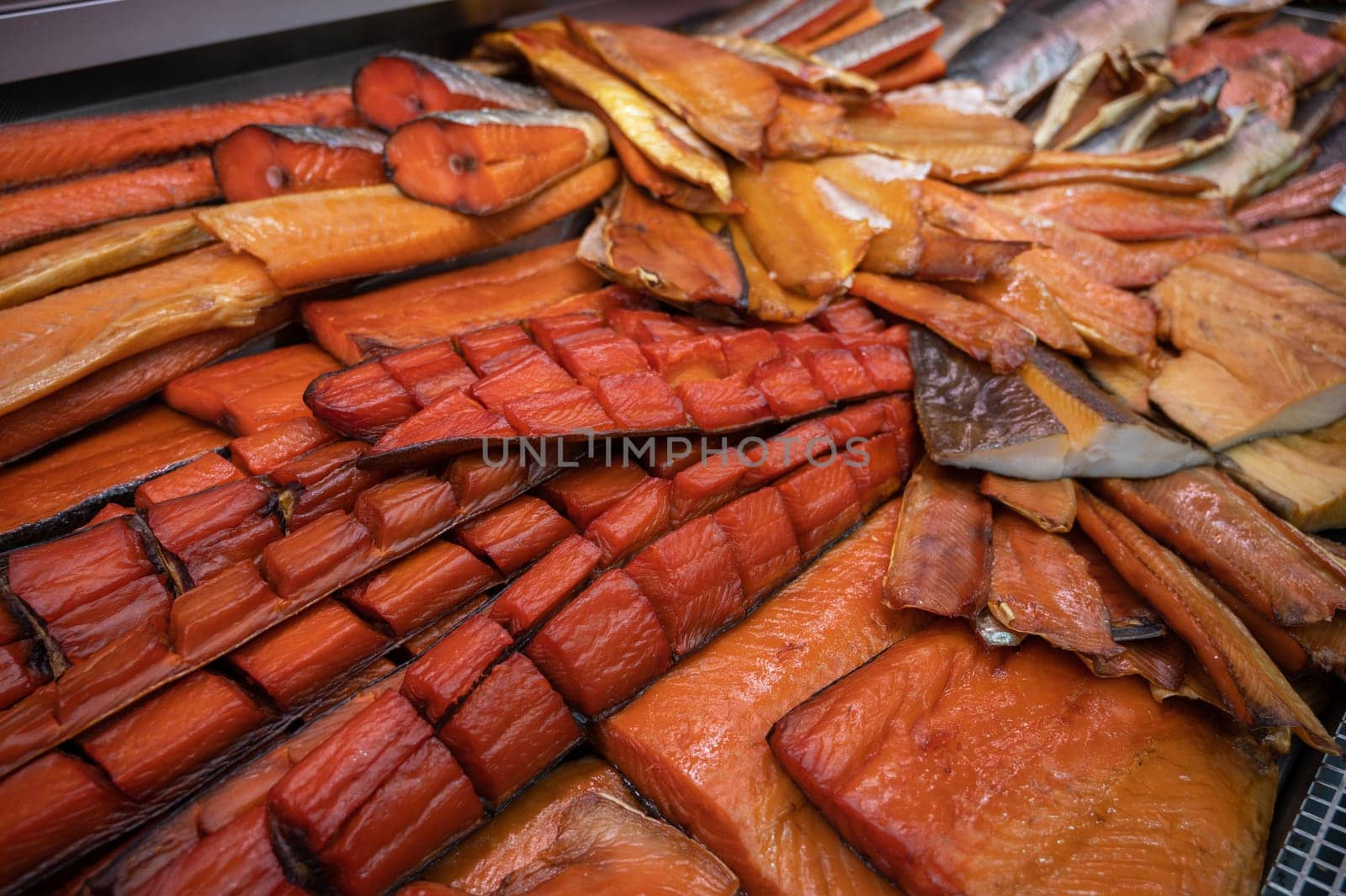 Various smoked fish products. Healthy eating and fish market concept