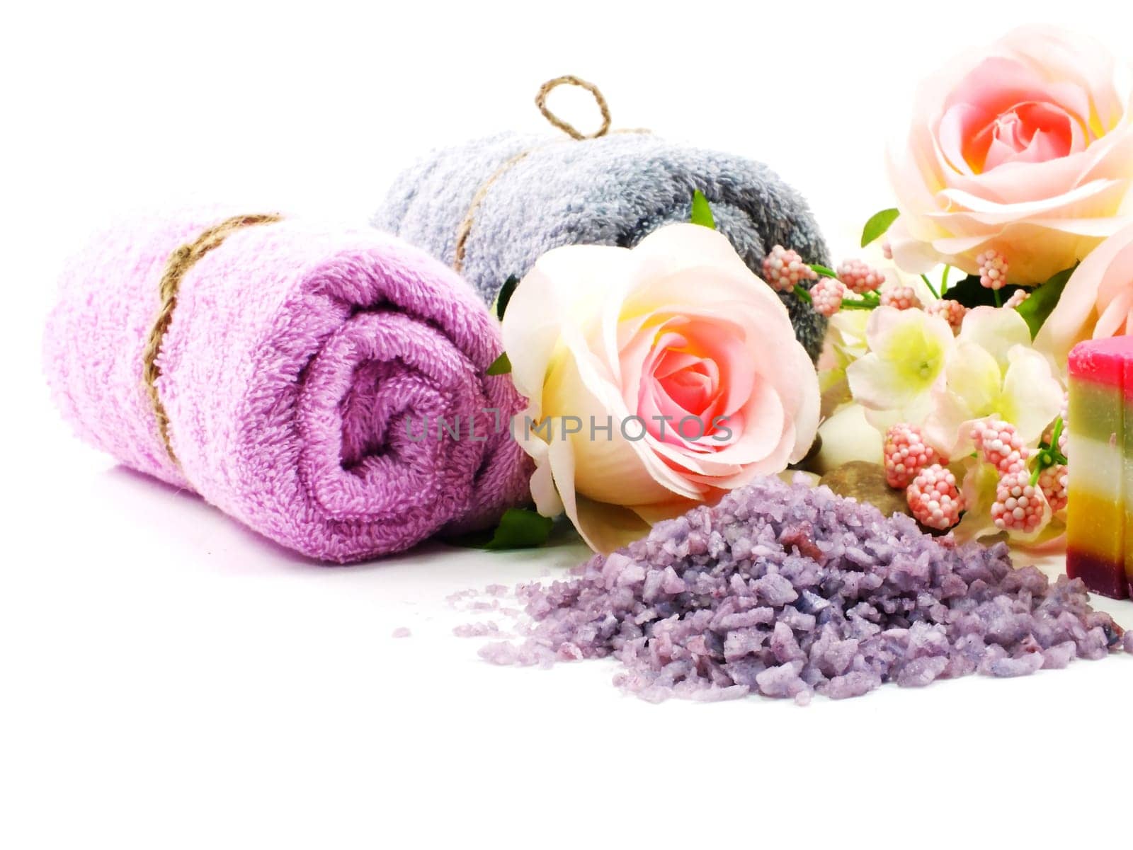 Hand-made soap and sea salt  on grey bamboo mat