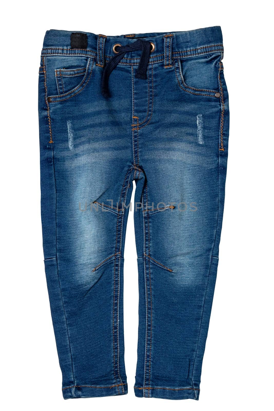Blue jeans. Closeup of a trendy stylish dark blue denim pants or trousers for boys isolated on a white background. Clipping path. Kids summer and autumn fashion. Front view.