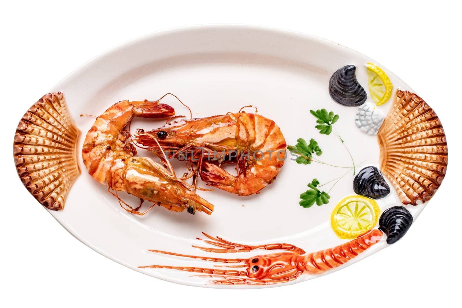 Closeup of fresh grilled large tiger prawns or shrimps on a colourful plate of seafood isolated on a white background. Healthy food concept. BBQ. Clipping path. Seafood background. Space advertising.