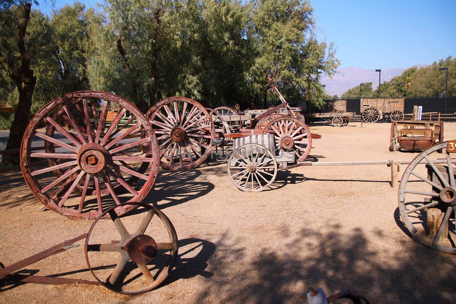 The wooden wheels of the traditional carriages in the desert in California