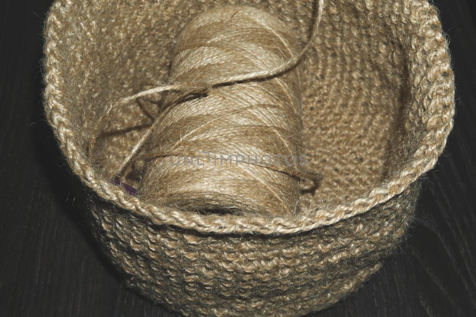 Jute needlework. handmade knitted basket