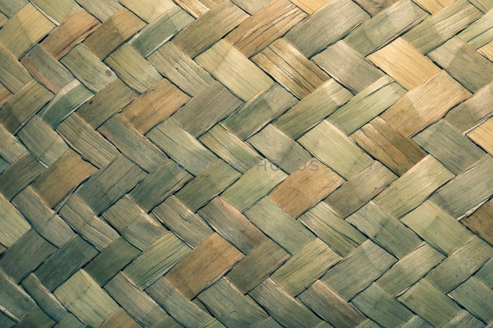 Detail of wicker basket surface close up. wooden background