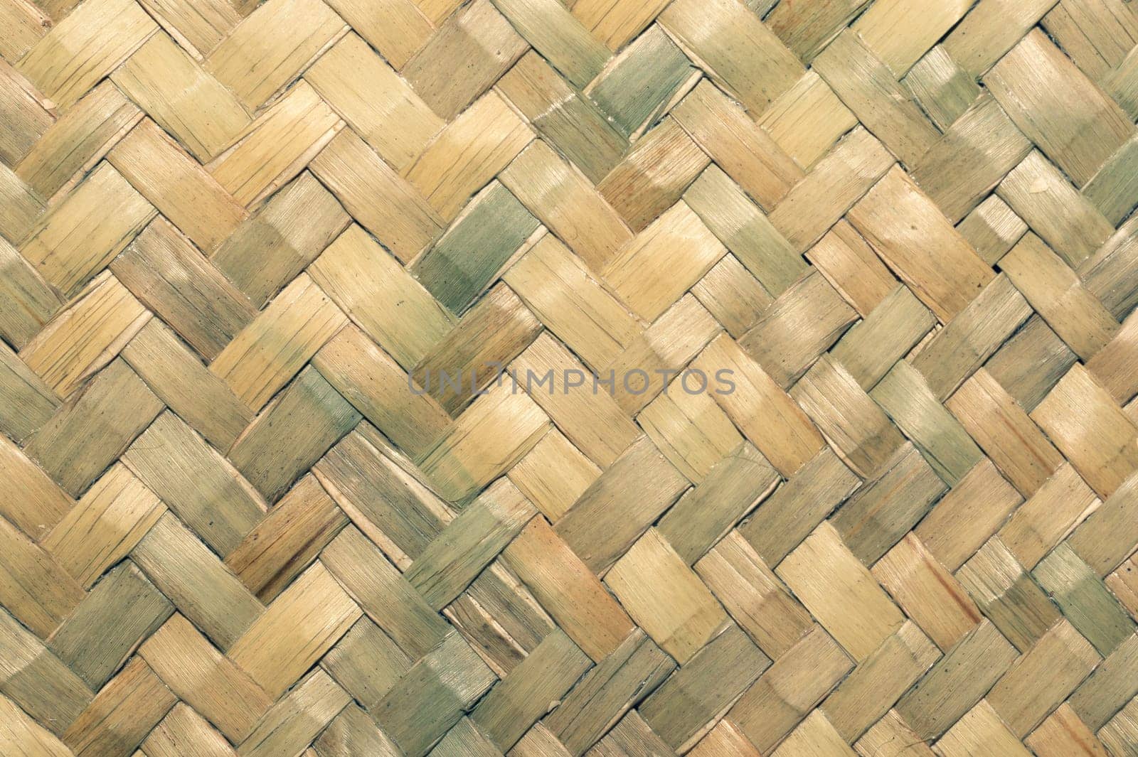 Detail of wicker basket surface close up. wooden background