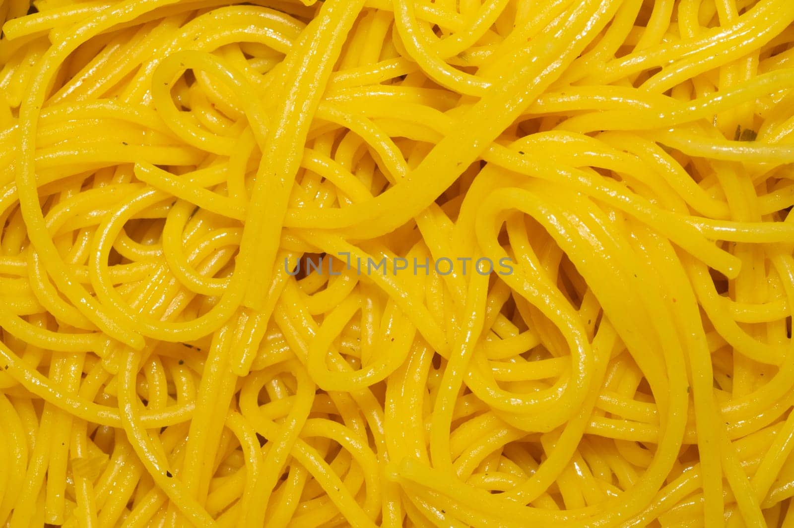 Pasta in oil close up. background with cooked spaghetti