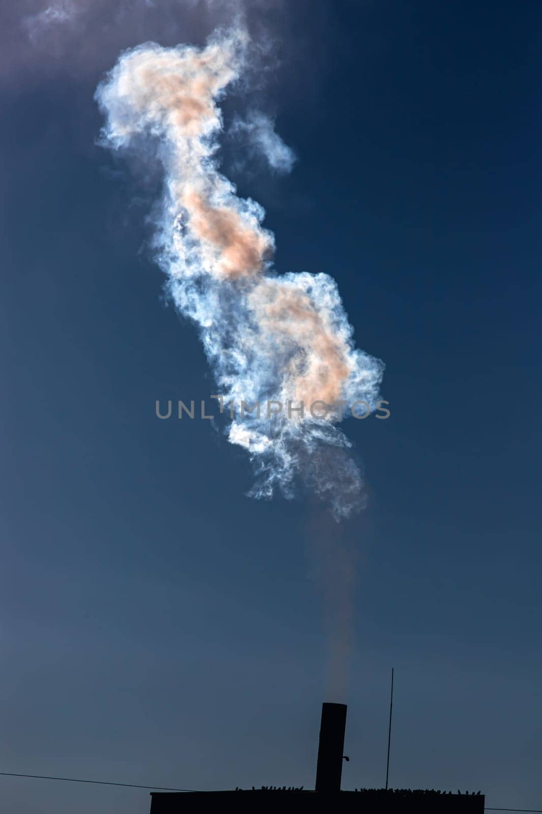 Air pollution from power plant chimneys. Industry and global warming concept