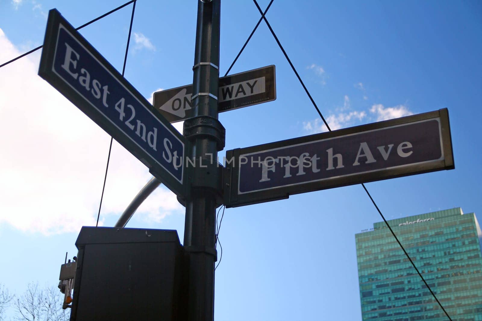 Blue East 42nd Street and Fifth Avenue historic sign in midtown Manhattan in New York