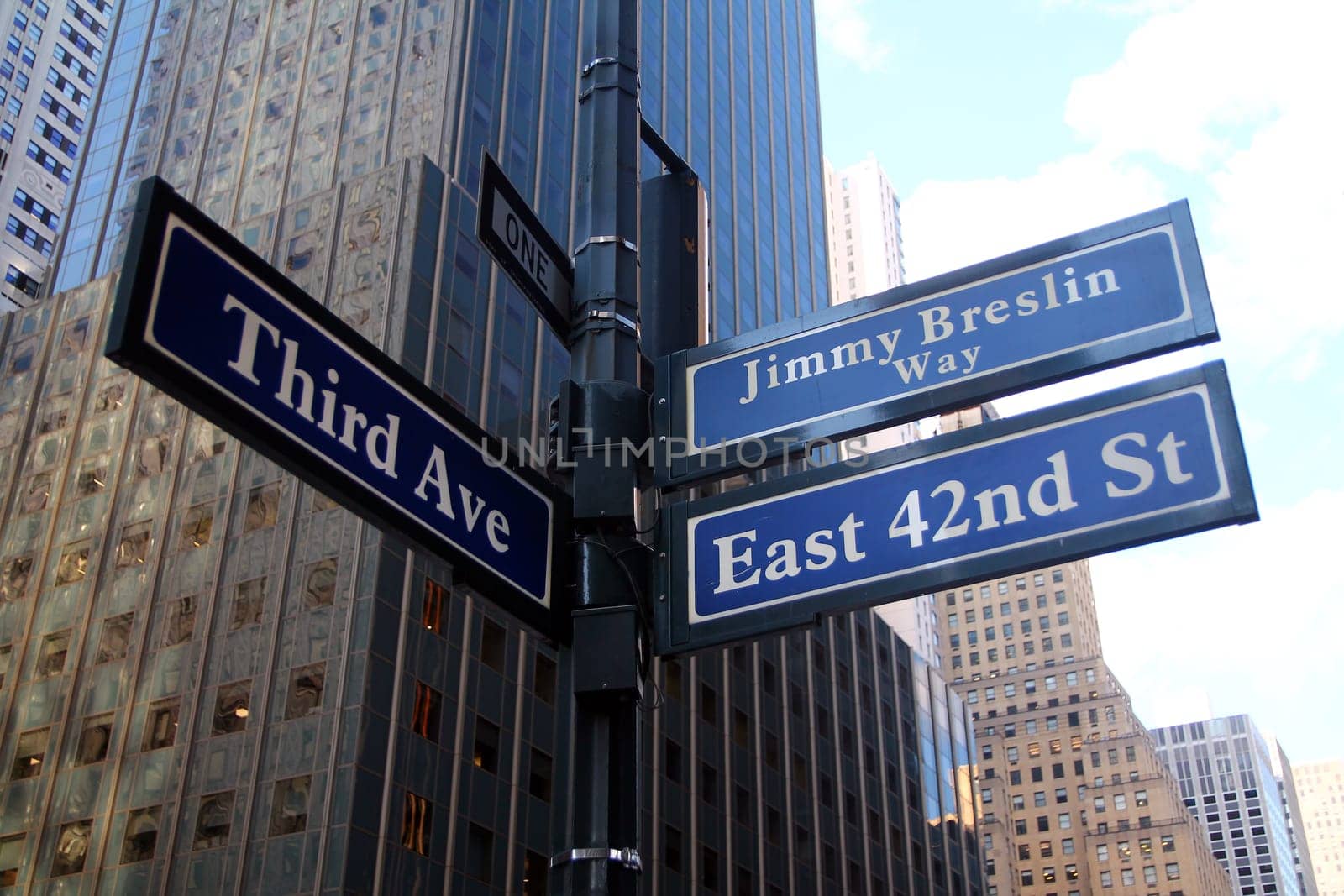 Blue East 42nd Street and Third 3rd Ave historic sign ( Jimmy Breslin Way ) in midtown Manhattan in New York