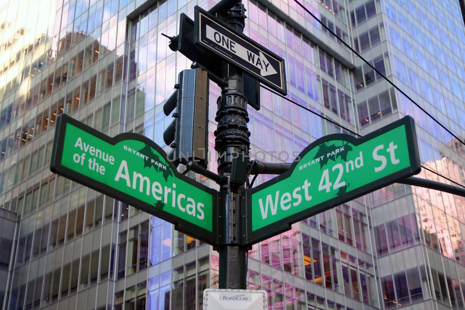 Green West 42nd Street and Avenue of the Americas 6th Bryant Park traditional sign in Midtown Manhattan in New York City