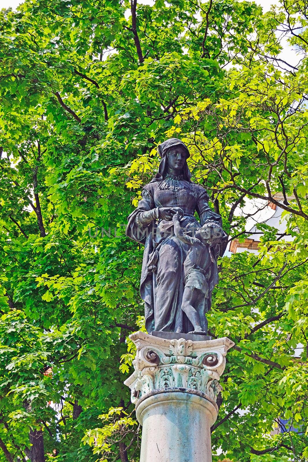 Park with sculpture "Charity""  from 19 th Century"