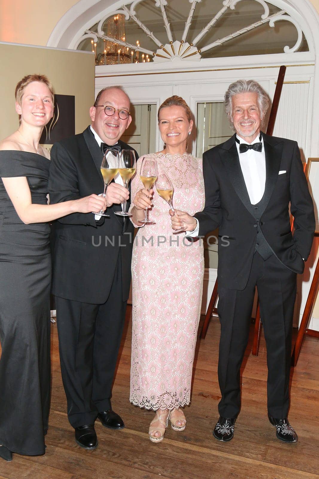 Denis Scheck (literary critic and prize-winner) with wife Christina Schenk and Frank Schaetzing with wife Sabina Valkieser-Schaetzing,awarding of the Champagne Prize for Joie de vivre at the Hotel Louis C. Jacob,Hamburg,27.04.2015