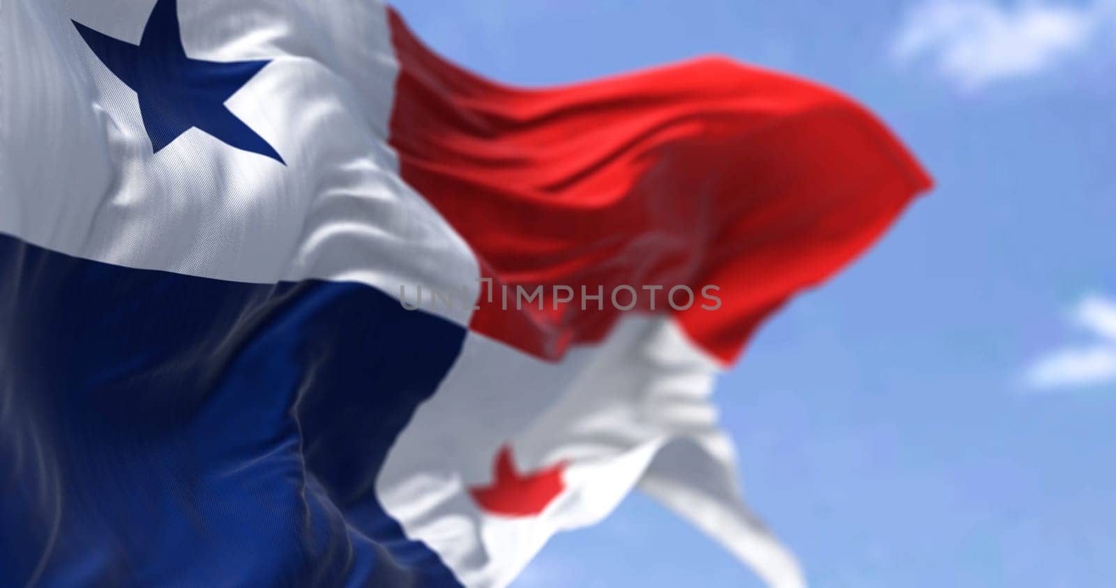 Detail of the national flag of Panama waving in the wind on a clear day. Democracy and politics. Patriotism. transcontinental country in Central America and South America. Selective focus.